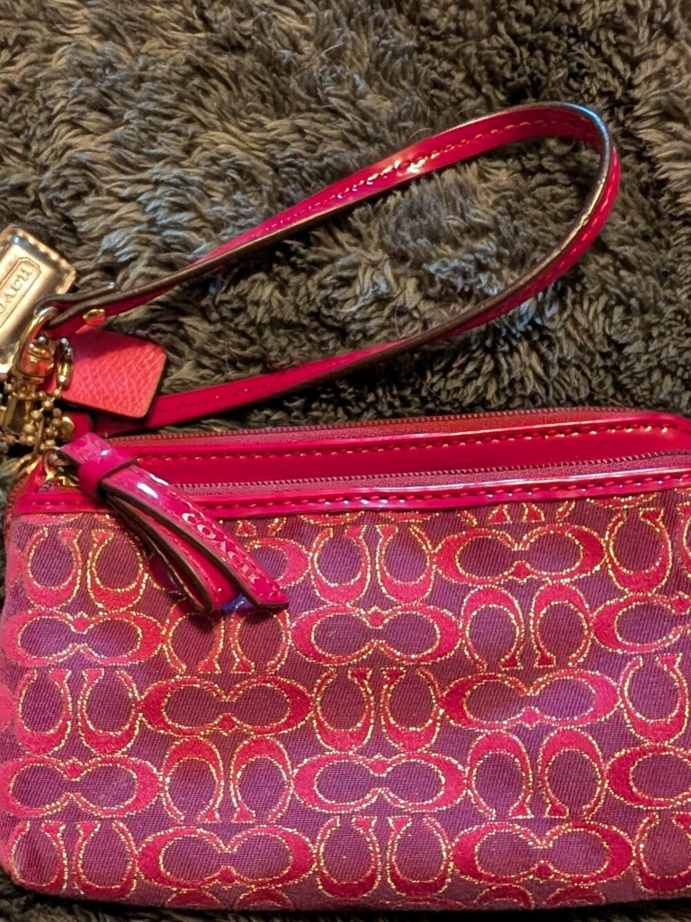 Purple and Pink Coach Wristlet